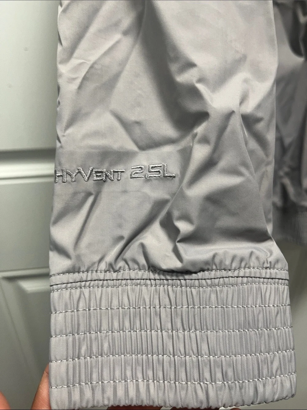 The North Face Light Gray women’s' Hooded Rain Jacket